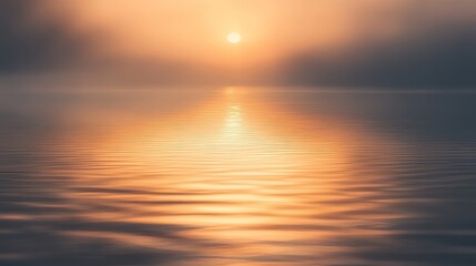 Obraz premium Abstract blurred sunrise with soft golden light reflecting on a dreamy horizon.