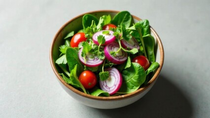 spinach salad onion tomato on a plate close-up view from above
