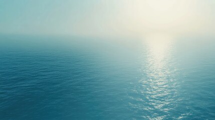 Obraz premium Cool blue blurred background with a subtle depth effect, resembling soft ocean waves or distant sky horizons.