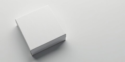 A Simple White Cardboard Gift Box on a Plain White Background, Ideal for Product Mockups and Presentation Designs