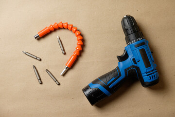 Essential tools for home repair projects featuring a battery-powered drill