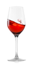 Rose wine splashing in glass on white background