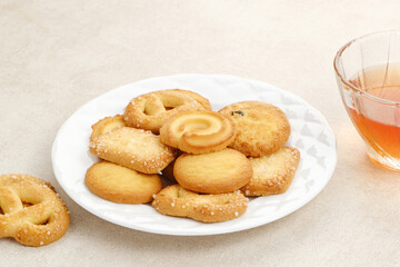 Assorted of danish butter cookies, served on a white plate.
