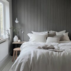 Bedroom featuring pillows and a bed with a white duvet