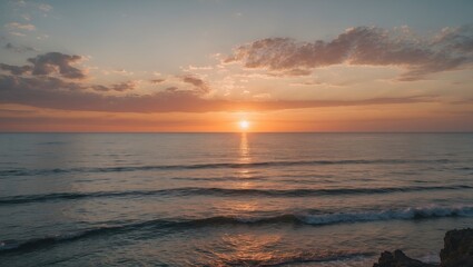 Fototapeta premium Tranquil Summer Sunset Over Calm Sea Dramatic Landscape with Vibrant Colors and Clear Skies Perfect for Inviting Text and Inspiration