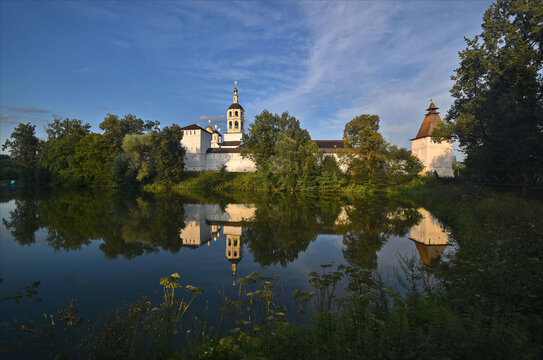 View of the St. Paphnutiev Borovsky Monastery from the ponds in summer. Russia, Kaluga region. Orthodox monastery.