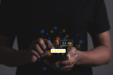 Customer Review, Young Man hand holding Smart Phone with five star to review and give 5 stars with very good results in service, Good review 5 star rating choice feedback