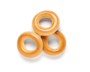 Delicious bagels on white background