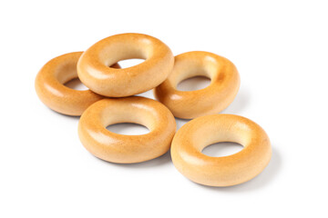 Delicious bagels on white background