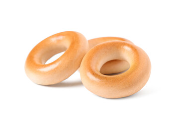 Delicious bagels on white background