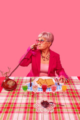 Elderly woman in pink outfit holding vintage telephone, exuding classic charm while engaging in call, waffles and colorful drinks arranged on table. Food pop art photography. Concept of fashion