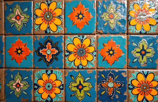 Colorful talavera tiles create decorative mosaic surface. Ceramic floral design pattern, texture background. Traditional mexican art, craft. Vibrant ornament, mediterranean vintage rustic culture