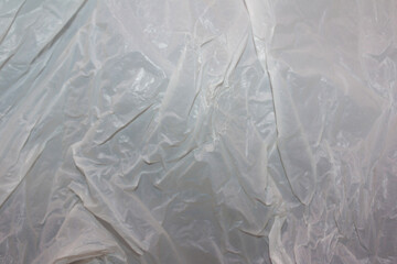 Obraz premium Abstract White Wrinkled Recycled Plastic Texture Background for Design