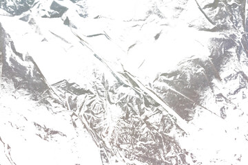 Naklejka premium Overlay of Old Grainy Crumpled Plastic Texture with Transparent Background