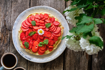 Tart with custard, strawberries. Chamomile, mint, summer.