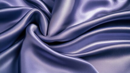 Obraz premium Silky purple fabric draping elegantly with soft folds and textures