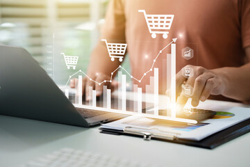 Businessman analyzing sales data, financial growth graph chart report and Using Calculator To Sum...