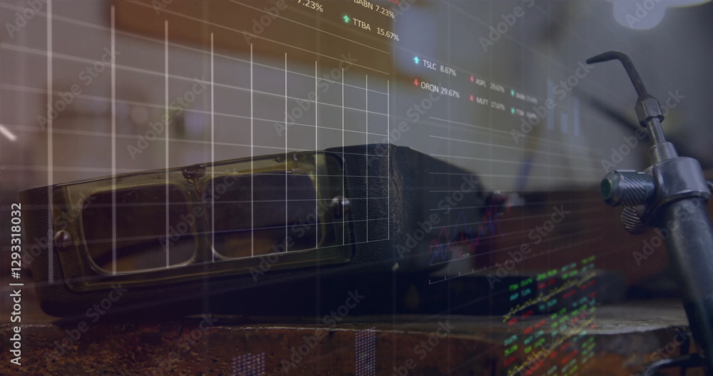 Poster image of financial data processing over goggles and tools in workshop