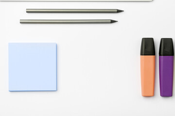 Image with school supplies, colored stickers, notebooks. Pens, pencils, rullers, calculator, keyboard. Assortment office items. Important information written on paper.