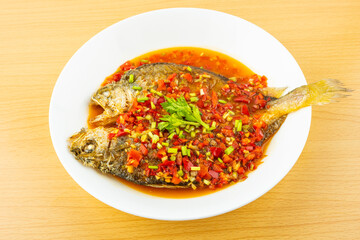 A plate of delicious yellow croaker with chopped pepper