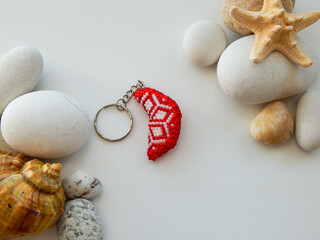 Bead colorful key chain and sea coast