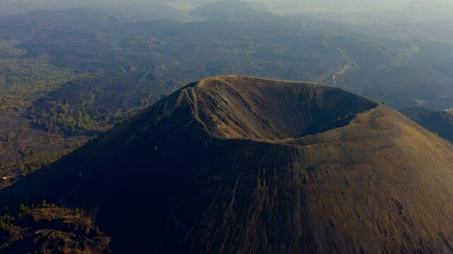 DRONE: HALF ORBIT SHOT OF PARICUTIN VOLCANO AT EARLY MORNING NEAR URUAPAN