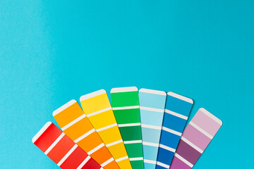 Color palette on a bright colored background. Color palette guide. paper catalog of rainbow color....