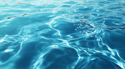Obraz premium Clear blue water with gentle ripples and a few bubbles. 