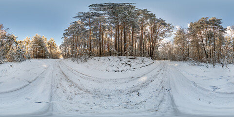 winter full spherical hdri 360 panorama view pedestrian road in snowy forest in equirectangular...