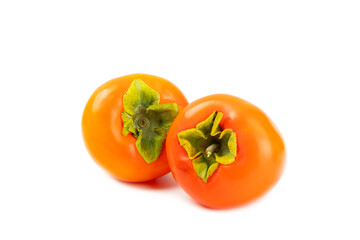 Persimmon isolated on white background. Persimmon fruit. Slice of ripe, juicy, sweet persimmon fruit. Vegan. Fruit garden. Close-up.