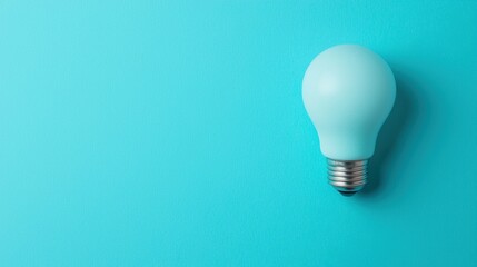Light bulb on a blue background. Concept of idea, creativity, and innovation.