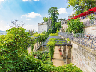View from above of the symmetrically designed terraced garden of Wernigerode Castle, Saxony-Anhalt. Cultural attractions of Germany.