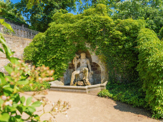 Neptune Fountain in the symmetrically designed terraced garden of Wernigerode Castle. Cultural attractions of Germany.