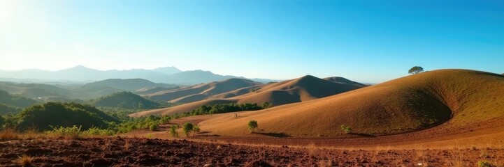 Rolling hills of chocolate brown landscape under clear blue sky, chocolate hills, green, bohol