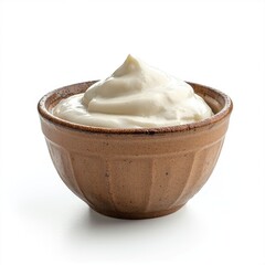 A bowl of creamy white yogurt or mayonnaise on a white background.