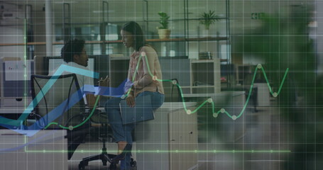 Image of financial data processing over diverse business people in office