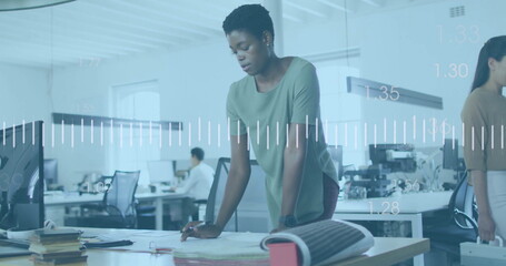 Image of financial data processing over diverse colleagues working in office