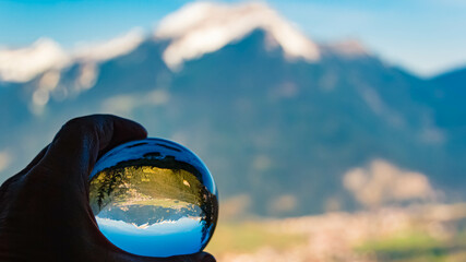 Crystal ball alpine summer landscape shot at Ehrwalder Alm, Ehrwald, Reutte, Tyrol, Austria
