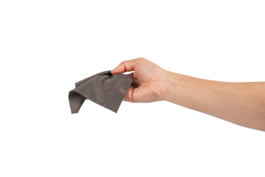 Hand and crumpled microfiber cleaning cloth, isolated on transparent background
