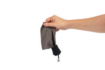 Hand and crumpled microfiber cleaning cloth, isolated on transparent background