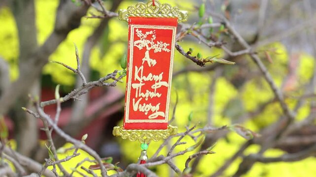 Lunar new year card on branch.