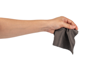 Hand and crumpled microfiber cleaning cloth, isolated on transparent background