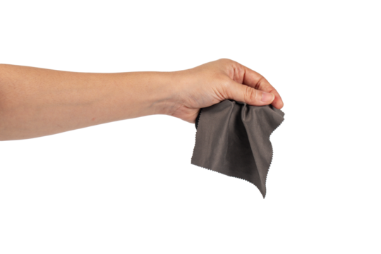Hand and crumpled microfiber cleaning cloth, isolated on transparent background