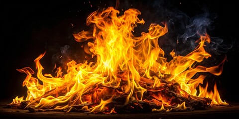 Bright Flames Dancing Against Dark Background in Night Fire Scene