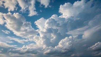 Dramatic cloud formations against a blue sky creating a serene and beautiful natural landscape backdrop for various design projects