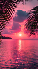 Photograph of a dark pink sunset over the ocean with palm leaves
