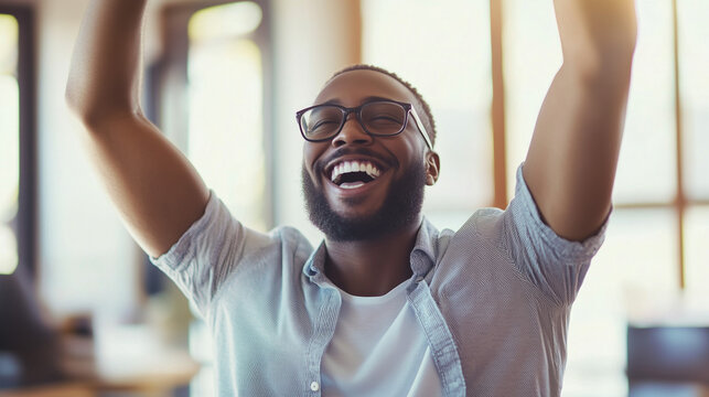 Joyful Triumph: A jubilant individual, his arms raised in exuberant celebration, radiating an infectious smile of pure happiness, embracing the moment's elation. 