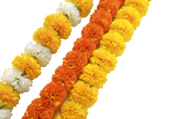 Traditional Indian marigold flower garland with vibrant orange and yellow blooms, isolated on white.
