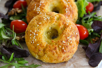 Homemade Cheese Bagels with Fresh Greens and Nuts