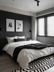 The black accent wall bedroom contrasts the white bedding and art